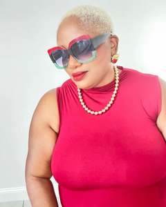 Elegant ruched shoulder sleeveless mock neck top in black and red — sophisticated women’s fashion top for work