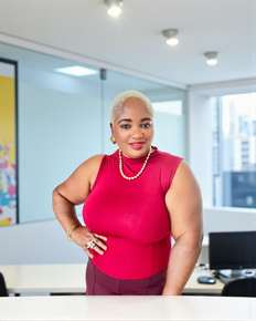 Elegant ruched shoulder sleeveless mock neck top in black and red — sophisticated women’s fashion top for work